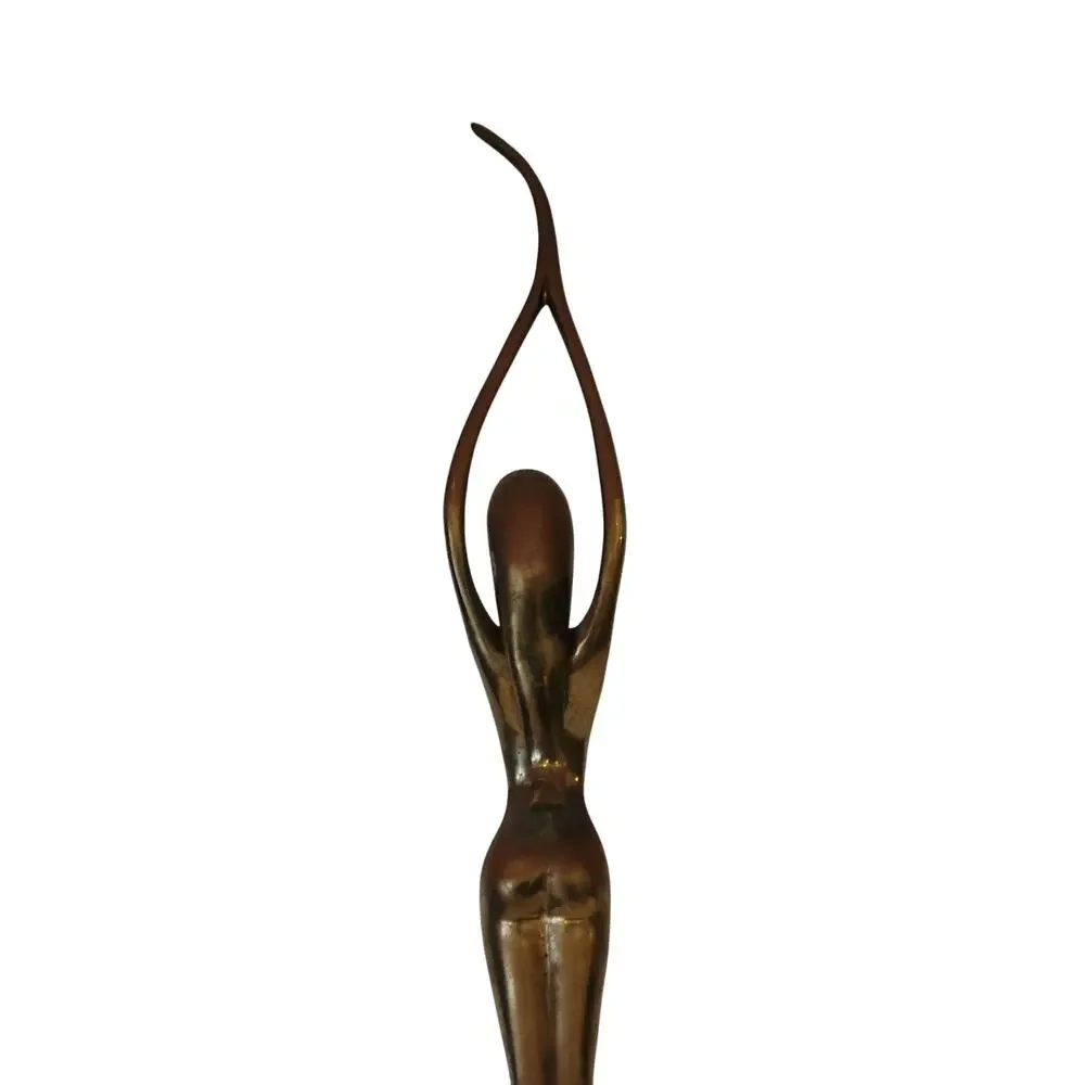 Vintage Mid-Century Modern (MCM) brass sculpture of an elongated female figure